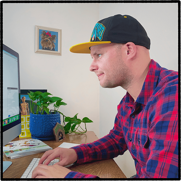 Jordan at his computer happily typing away